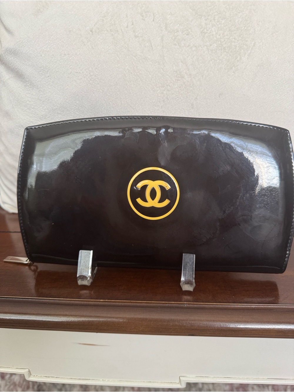 CHANEL Black Patent Leather Clutch with Gold CC Medallion